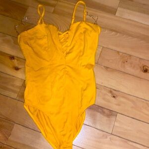 super cute and comfy body suit. Brand new hasn’t been worn. Super convenient.